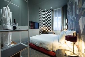Posteľ alebo postele v izbe v ubytovaní Stories Boutique Hotel