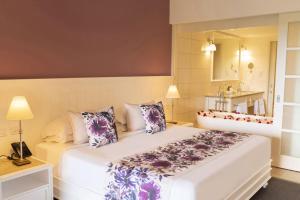 Postel nebo postele na pokoji v ubytování Maritim Resort & Spa Mauritius