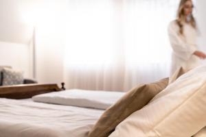 Voodi või voodid majutusasutuse Stadthotel Styria toas