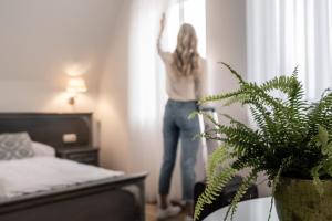 Voodi või voodid majutusasutuse Stadthotel Styria toas