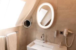 Vannituba majutusasutuses Stadthotel Styria