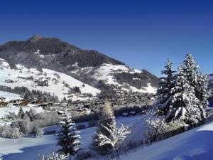 a small town on a snow covered mountain at Belambra Clubs Praz-sur-Arly - L'Alisier in Praz-sur-Arly +31 photos