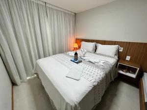 Imagen de la galería de Magnífico APARTAMENTO de Charme - 3 quartos AR CONDICIONADOS SPLIT - Beira Mar, 2 banheiros, 2 vagas garagem, 4 varandas, 2 elevadores, Redes para descanso, Wi-Fi, Air Fryer, Disney Plus, Star Plus, HBO Max, Guarda Sol, Cadeiras de Praia e Caixa Térmica, en Guarapari