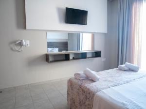Posteľ alebo postele v izbe v ubytovaní Miva Sea View