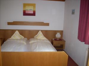 Ένα ή περισσότερα κρεβάτια σε δωμάτιο στο Haus Puit Mandarfen Pitztal