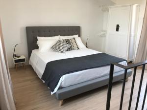 Voodi või voodid majutusasutuse TOREMARE SUITE MARZAMEMI toas