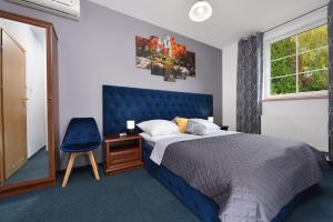 Postel nebo postele na pokoji v ubytování Hotel AGAT