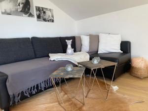 Posezení v ubytování Ferienwohnung Konzept Schmiede