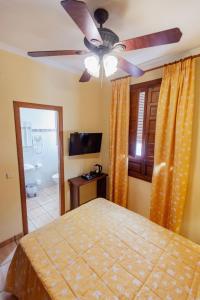 Postel nebo postele na pokoji v ubytování Hostal Loreto