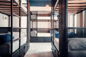 Postel nebo postele na pokoji v ubytování JOY Setas Coworking