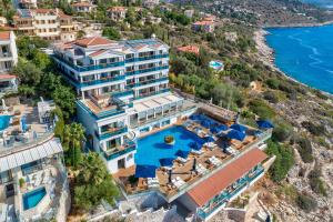 an aerial view of a resort with a pool at Meis Exclusive Hotel in Kaş