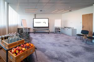 TV o dispositivi per l'intrattenimento presso FIRMAMENT Hotel