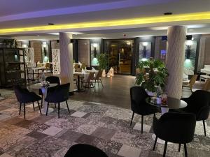 Posedenie v ubytovaní Arena Hotel Spa & Wellness