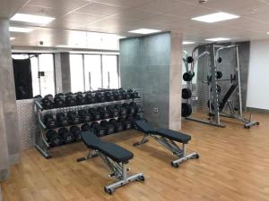 The fitness centre and/or fitness facilities at Modern Studio Apartment at The Hub