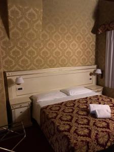 A bed or beds in a room at CASA MARGOT