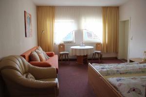 Posezení v ubytování Hotel Gasthof Zum weissen Lamm