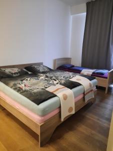 A bed or beds in a room at High-Quality in the heart of Stuttgart 4