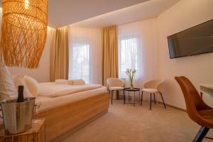 A television and/or entertainment centre at Hotel U Kaplicky