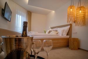 A bed or beds in a room at Hotel U Kaplicky