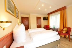 Ein Bett oder Betten in einem Zimmer der Unterkunft Hotel Beretta