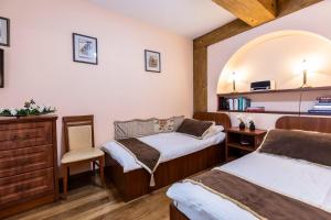 Giường trong phòng chung tại Portofino