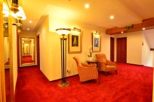 Ein Sitzbereich in der Unterkunft Hotel Beretta