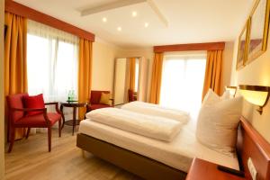 Ein Bett oder Betten in einem Zimmer der Unterkunft Hotel Beretta