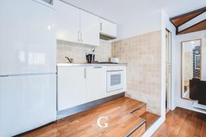 Kuchyňa alebo kuchynka v ubytovaní Residenza Gonfalone