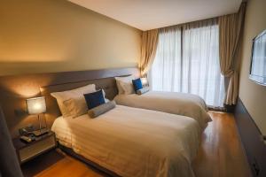 Postel nebo postele na pokoji v ubytování Gray Boutique Hotel Casablanca