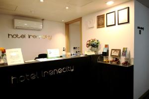 a hotel reception desk in a hotel room at Hotel Irene City in Seoul