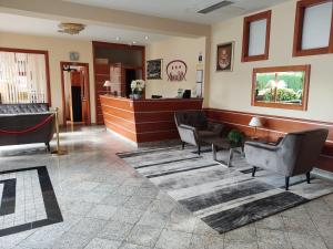 The lobby or reception area at Hotel Amalia