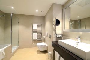 Kúpeľňa v ubytovaní HiLight Suites Hotel
