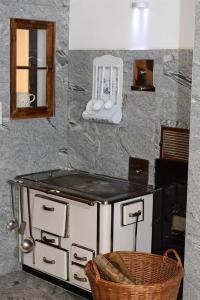 a counter top with a hair dryer and a mirror at Gästehaus Flöry in Schruns-Tschagguns