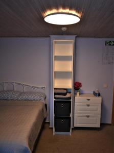 Postel nebo postele na pokoji v ubytování Guest House Gero Vėjo Namai