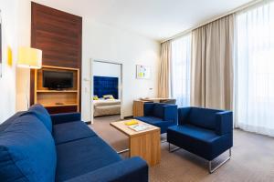 Zona d'estar a HiLight Suites Hotel