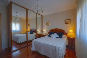 Postel nebo postele na pokoji v ubytování A Casa da Tía Babel