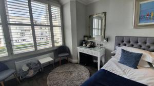 Ένα ή περισσότερα κρεβάτια σε δωμάτιο στο A Room With A View