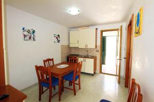 A kitchen or kitchenette at Appartamenti Leuca 50 m dal mare