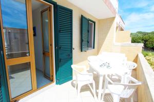 A balcony or terrace at Appartamenti Leuca 50 m dal mare