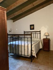 Postel nebo postele na pokoji v ubytování Casa Rural La Navarra + 37 fotografií