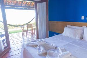 Cama ou camas em um quarto em Hotel Praia dos Carneiros by AFT