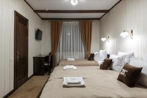 Кровать или кровати в номере GasthauS & SPA