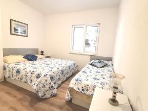 Postel nebo postele na pokoji v ubytování Top 10-1 bedroom apt/terrace