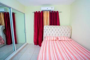 Una cama o camas en una habitación de Villas Garcia