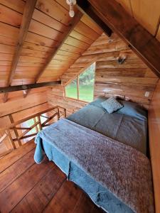Postel nebo postele na pokoji v ubytování Charming cabin surrounded by nature