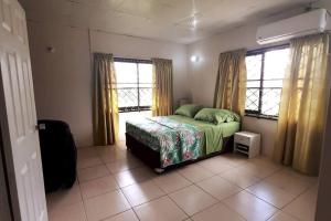 Postel nebo postele na pokoji v ubytování Mango Vert House + 33 fotografií