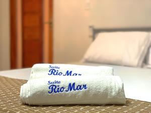 Postel nebo postele na pokoji v ubytování Suites RioMar