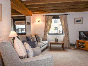 Televiisor ja/või meelelahutuskeskus majutusasutuses Bramble Cottage