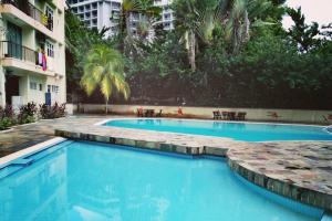 The swimming pool at or close to Cozy NEAR-BEACH Apartment ~The Napping House 海滨公寓~