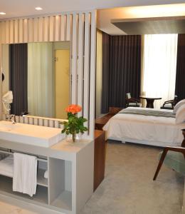 Кровать или кровати в номере Hotel do Parque